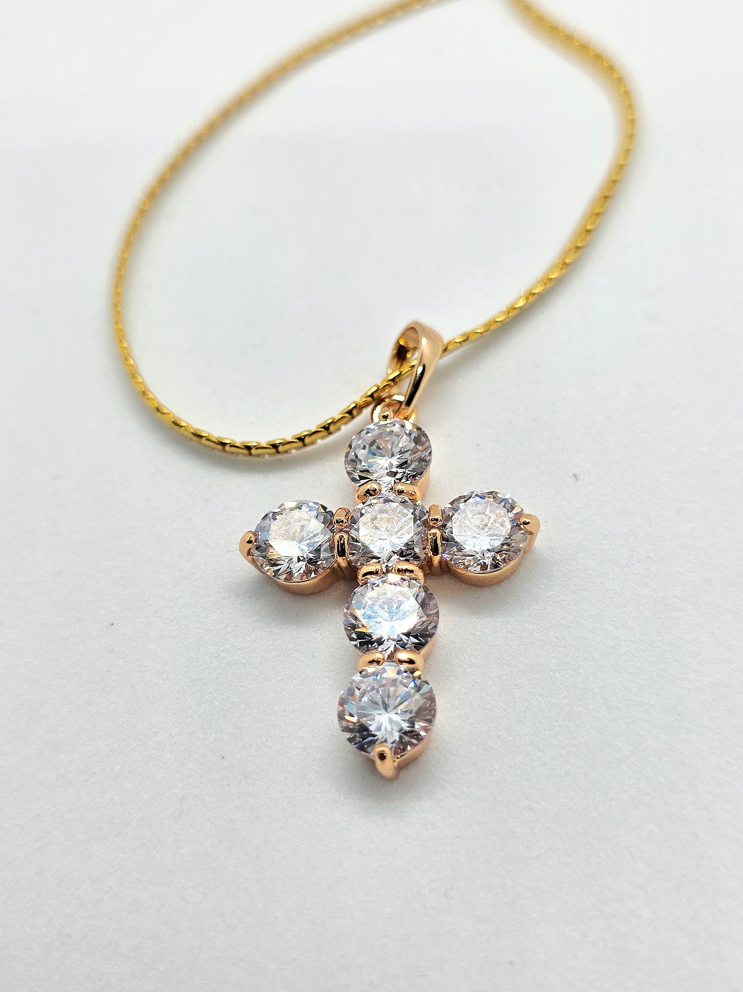 Radiant cross pendant necklace