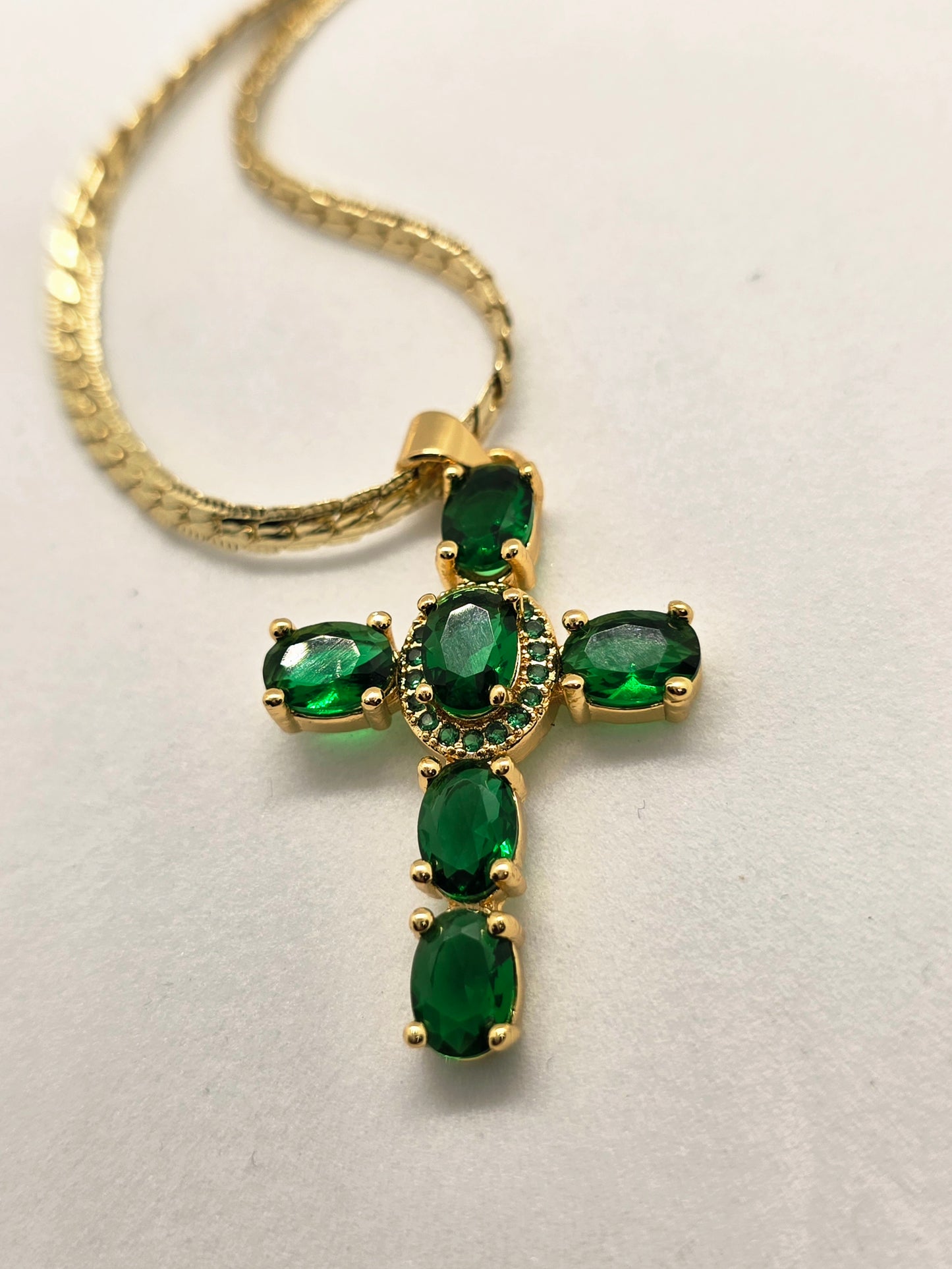 Emerald cross pendant necklace