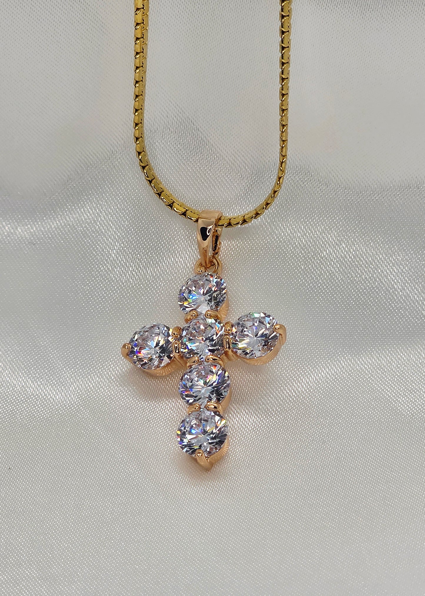 Radiant cross pendant necklace