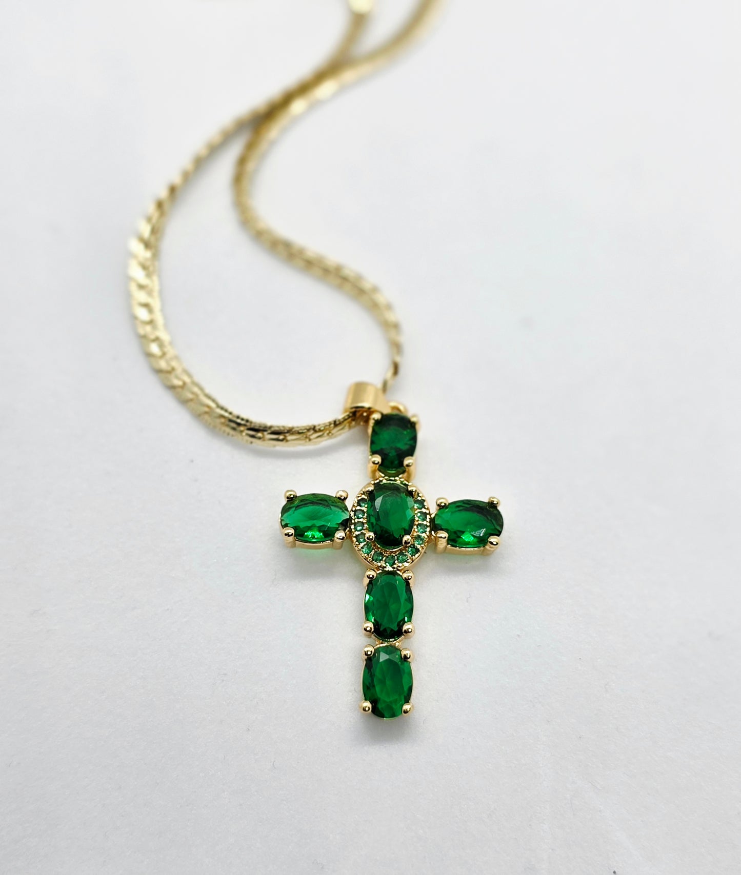 Emerald cross pendant necklace